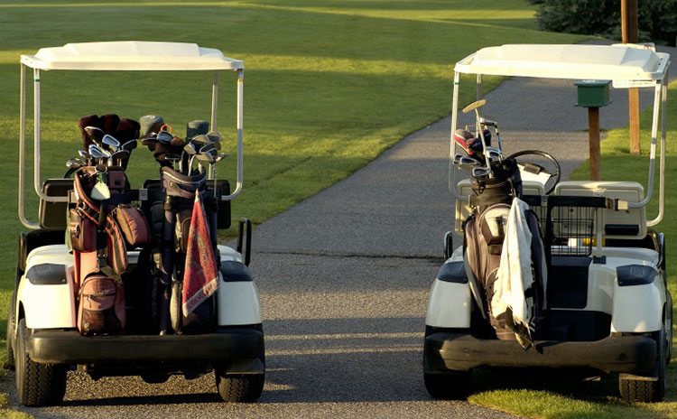view of golf carts on fairway